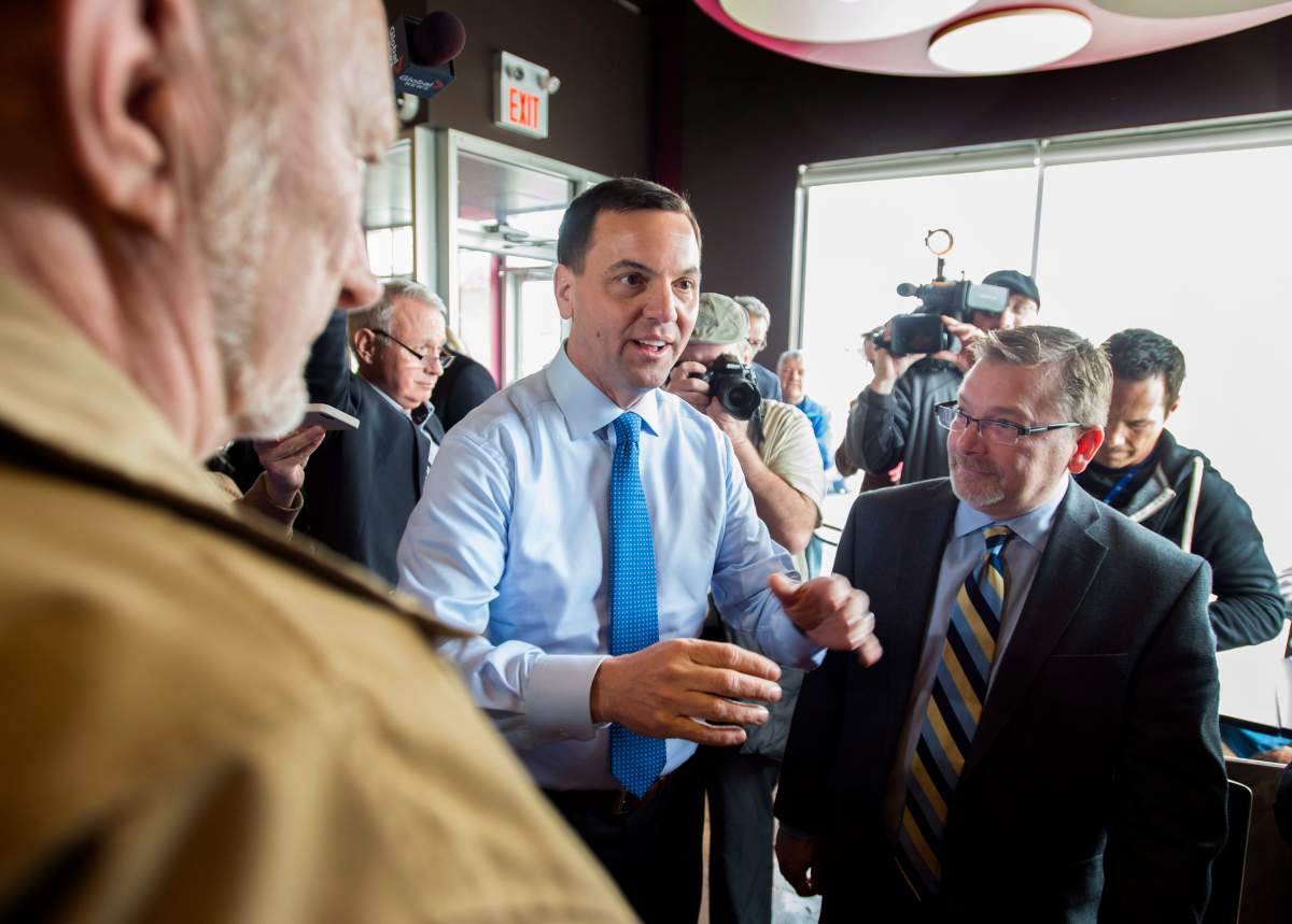 ntario PC Leader Tim Hudak visits supporters at Spin Dessert Cafe and Bistro while campaigning in Burlington, Ont. on Wednesday, May 7, 2014.