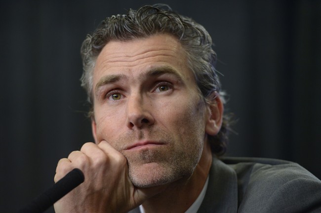 Vancouver Canucks president Trevor Linden listens to a question at a news conference in Vancouver on Thursday, May 1, 2014.