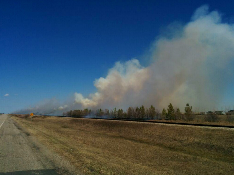 Emergency crews responded to a a large grass fire near the hamlet of Kronau, SK early Friday afternoon.