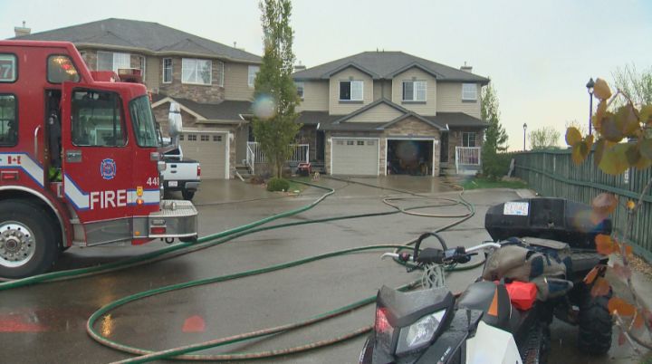 A duplex in the area of 121 Street and and 16 Avenue SW caught fire after being struck by lightning Sunday, May 25, 2014.