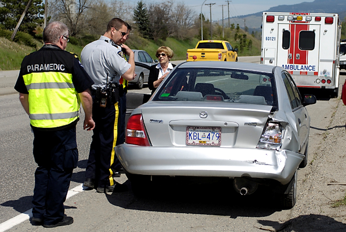 Logging truck driver hits car and keeps driving - image