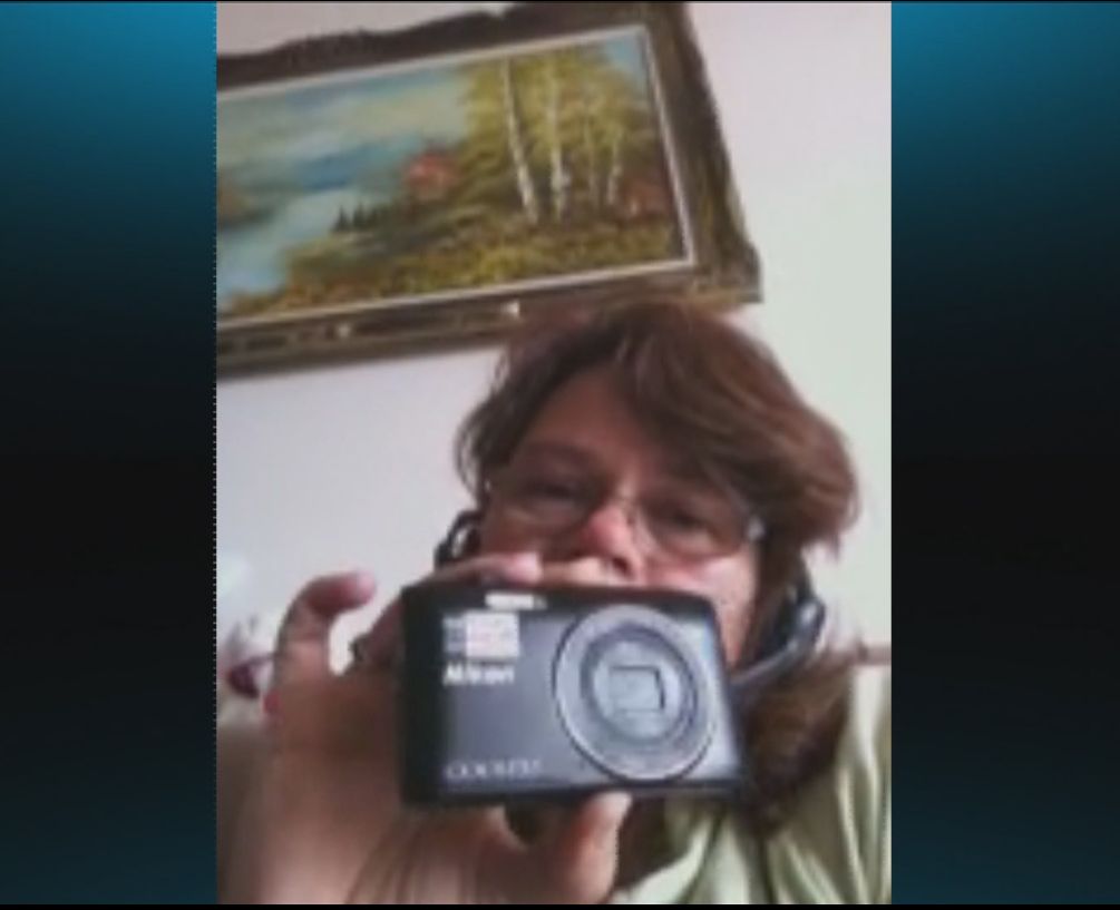 Lori Svendsen holding up a camera very similar to the one she lost at the Edmonton Expo Centre this week. 