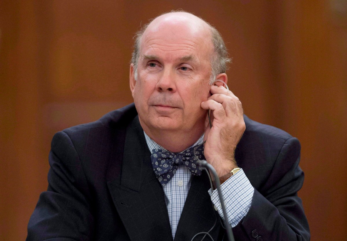 Justice Marc Nadon listens to opening remarks as he appears before a parliamentary committee following his nomination to the Supreme Court of Canada Wednesday October 2, 2013 on Parliament Hill in Ottawa. THE CANADIAN PRESS/Adrian Wyld.
