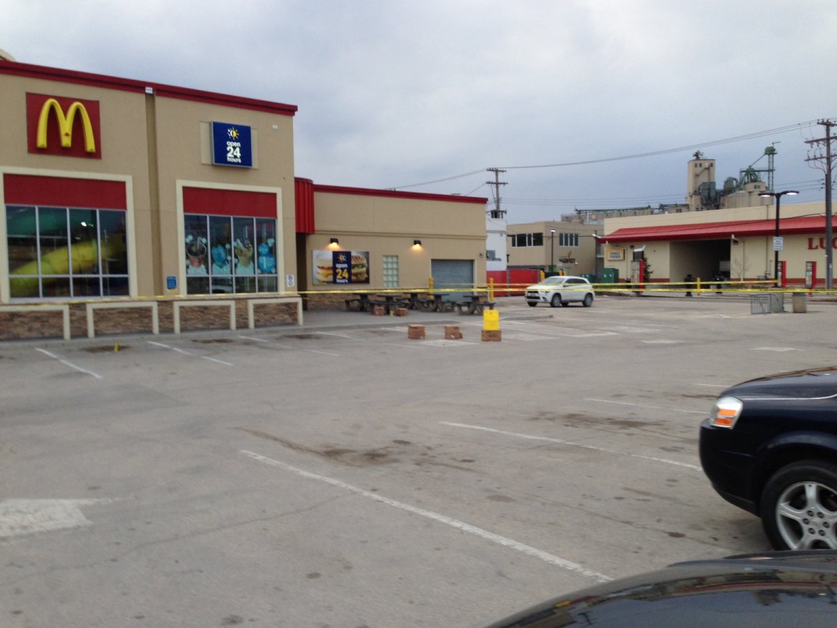 Winnipeg Police have the parking lot of the McDonald's on Notre Dame Avenue taped off on May 18, 2014.