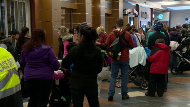 Families lined up hours before  the doors opened at Calgary immunization clinics.