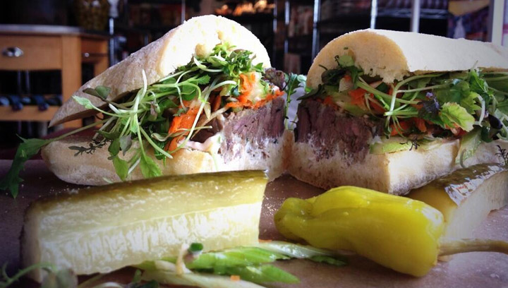 Darby Kells, the executive chef at Riversdale Delicatessen & Market, makes a pulled and pressed beef sandwich on Food for Thought.