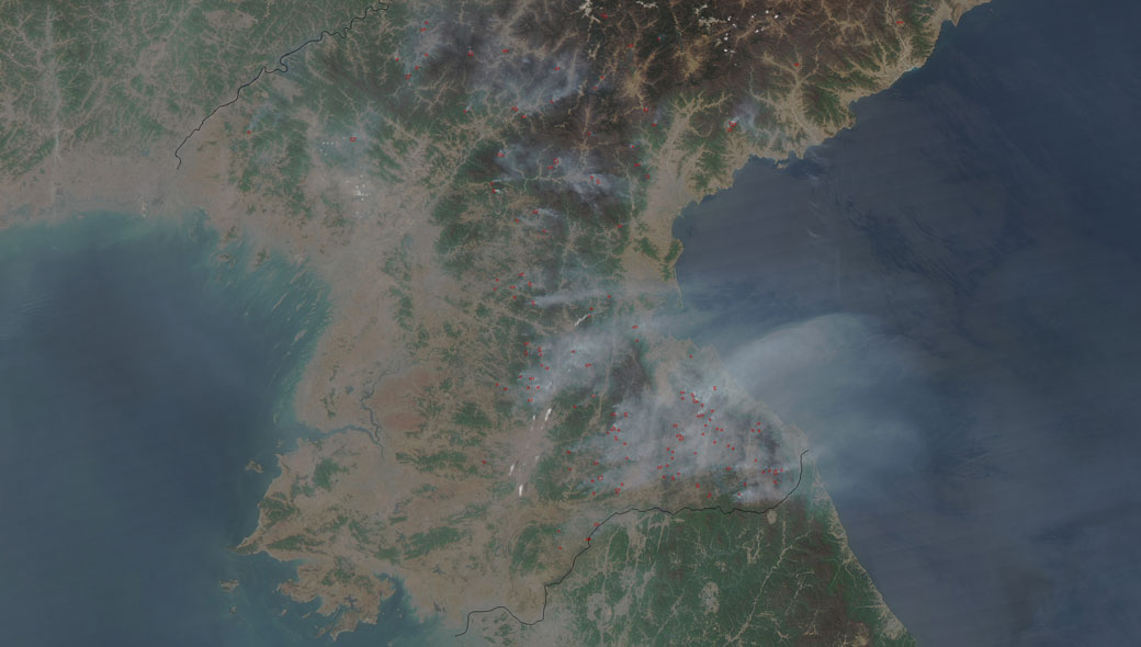 NASA has released a satellite photograph that shows dozens of fires burning in the southwestern parts of North Korea.