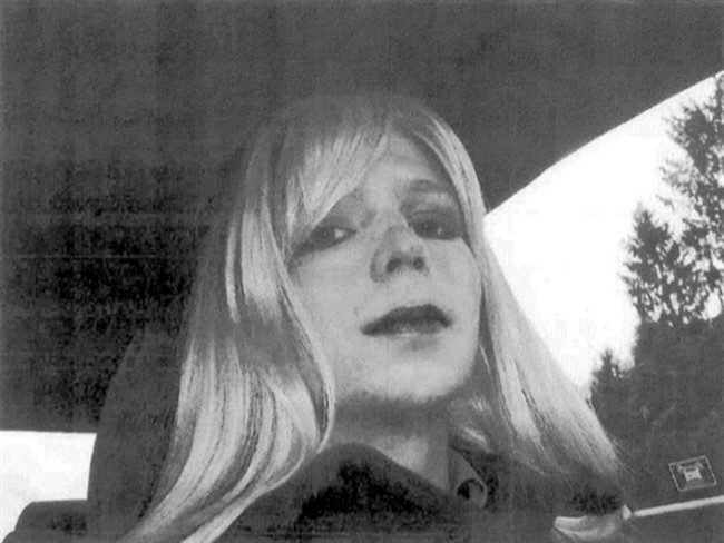 In this undated file photo provided by the U.S. Army, Pfc. Chelsea Manning poses for a photo wearing a wig and lipstick. In an unprecedented move, the Pentagon is trying to transfer convicted national security leaker Pvt. Chelsea Manning to a civilian prison so she can get treatment for her gender disorder, defense officials said Tuesday May 13, 2014. (AP Photo/U.S. Army, File).
