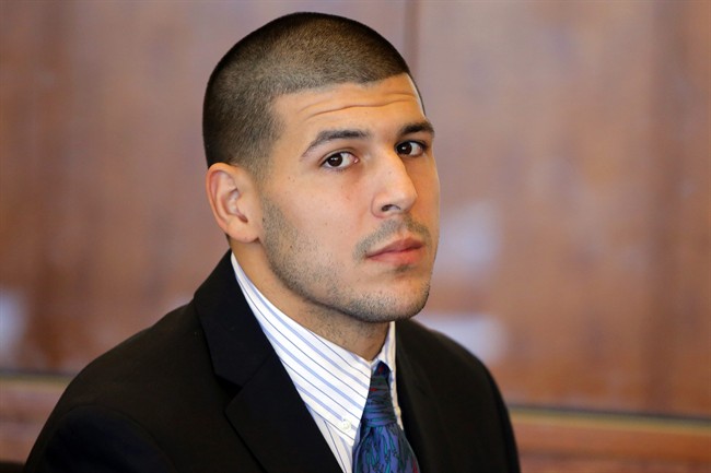 In this Oct. 9, 2013 file photo, former New England Patriots NFL football player Aaron Hernandez attends a pre-trial court hearing in Fall River, Mass. 