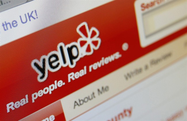 FILE - This March 17, 2010 file photo shows the Yelp website on a computer screen in Los Angeles.