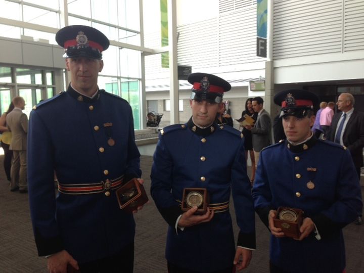 Three EPS officers honoured for jumping into cold, murky water last summer to save a person from their vehicle.