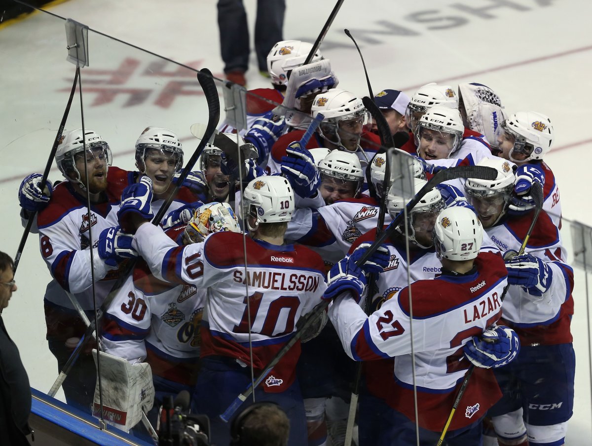 . The Edmonton Oil Kings celebrate their victory over the Val-d'Or Foreurs during the 2014 Memorial Cup tournament at Budweiser Gardens on May 23, 2014 in London, Ontario.