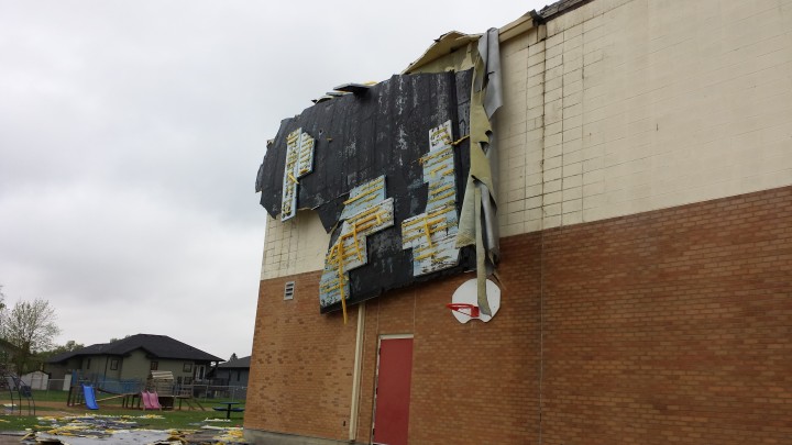 Part of a school gymnasium roof was ripped off when a strong storm walloped parts of central Saskatchewan last night.