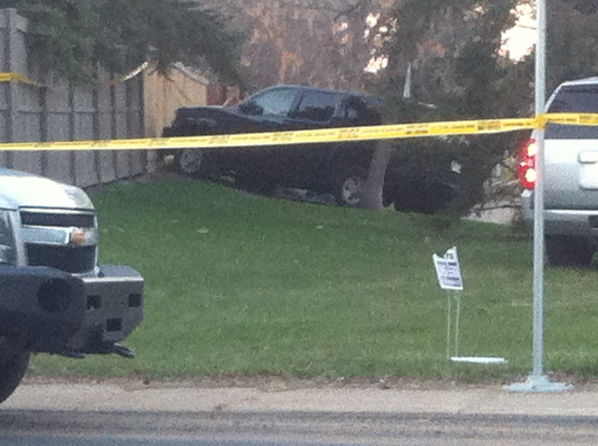 One person is dead and an Edmonton police officer is in hospital after a shootout in southwest Edmonton May 11, 2014.