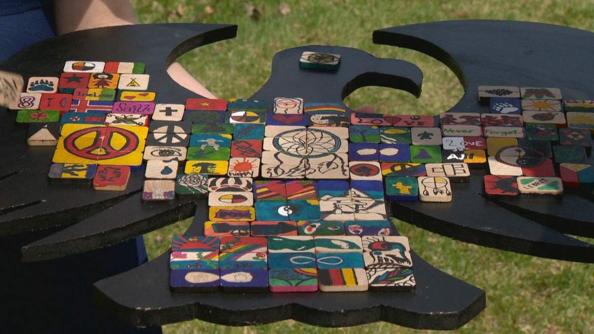 Students coloured inch-long tiles for the weeks-long unit. The tiles were smudged by the students Friday morning.