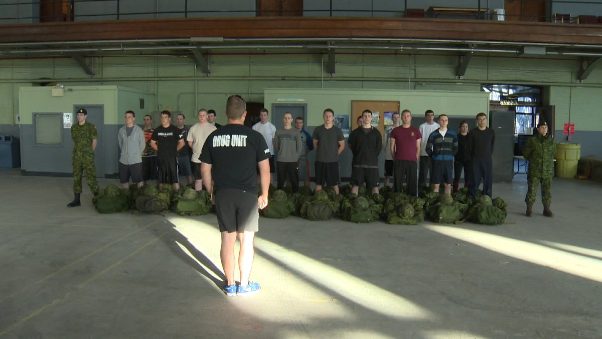 A group of young men and women train to be reservists inside the Halifax Armoury.