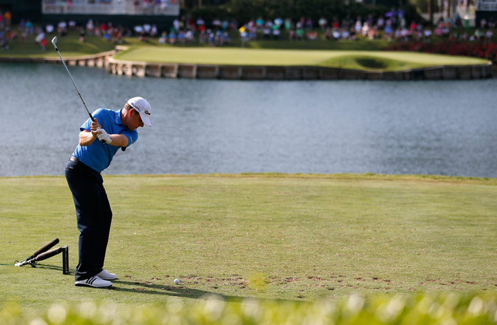  Justin Leonard of the United States hits his tee shot on the 17th hole during the first round of THE PLAYERS Championship on The Stadium Course at TPC Sawgrass on May 8, 2014 in Ponte Vedra Beach, Florida. 