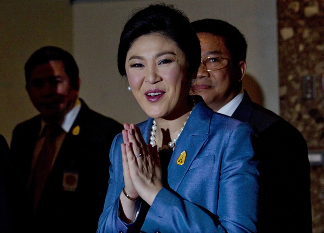 Thailand's Prime Minister Yingluck Shinawatra arrives at the Constitutional Court in Bangkok, Thailand, Tuesday, May 6, 2014.