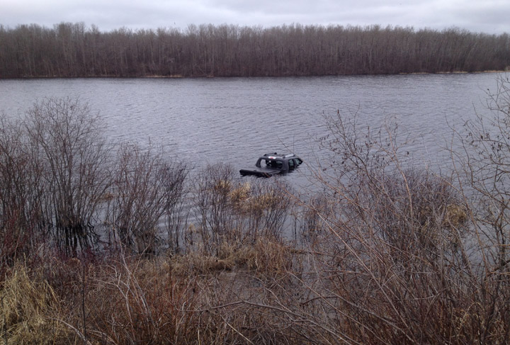 Saskatchewan RCMP say a submerged vehicle found Monday may have been on frozen lake.