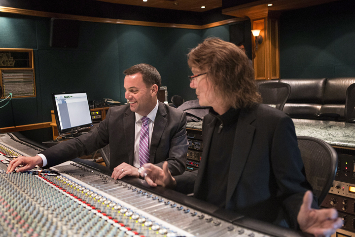 PC Leader Tim Hudak (left) sits in a recording studio with Gil Moore, the owner of Metalworks Studios, as Hudak hits the campaign trail in Ontario's Provincial election in Mississauga on Monday May 5 ,