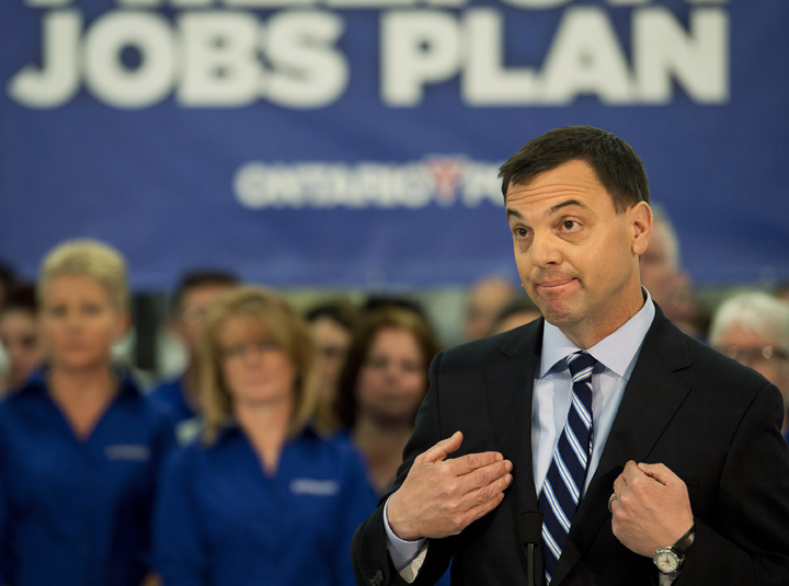 Ontario PC Leader Tim Hudak makes an announcement at a packaging plant about creating 40,000 jobs in Ontario with affordable energy during a campaign stop in Smithville, Ont., on Monday, May 12, 2014.