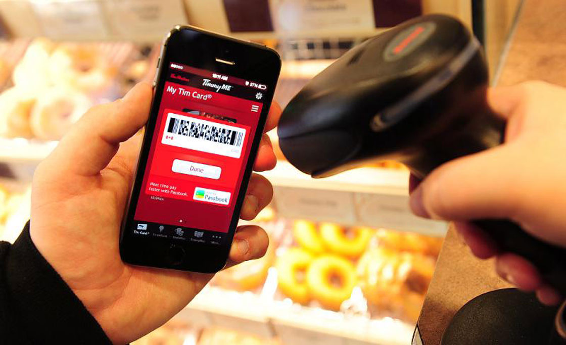 Tim Hortons hopes it can speed up queue wait times through a new smartphone app that can process purchases quickly.