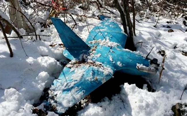 In this April 6, 2014 file photo, an unmanned drone lies on a mountain in Samcheok, South Korea. 