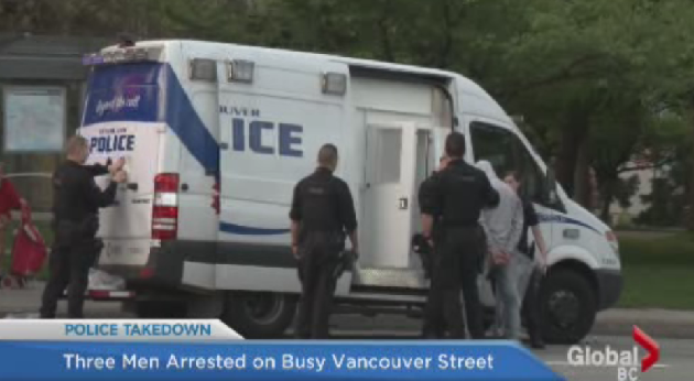 Vancouver Police arrest three men on a busy street.