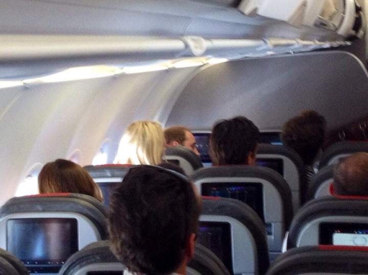 Prince William flies coach