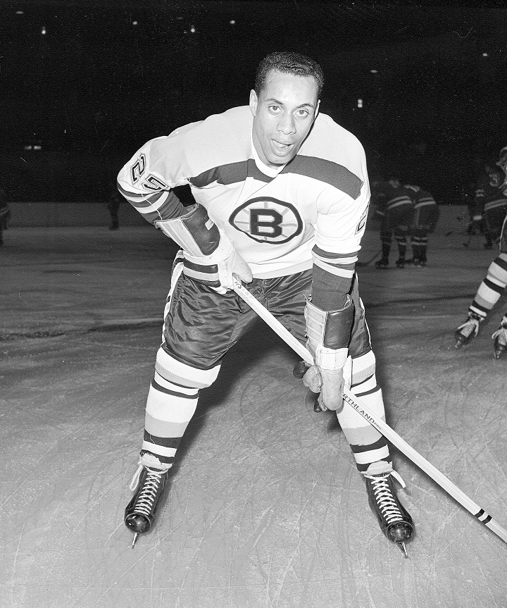 25-year-old left wing Willie O'Ree, the first black player of the National Hockey League, warms up in his Boston Bruins uniform, prior to the game with the New York Rangers, at New York's Madison Square Garden, on November 23, 1960.