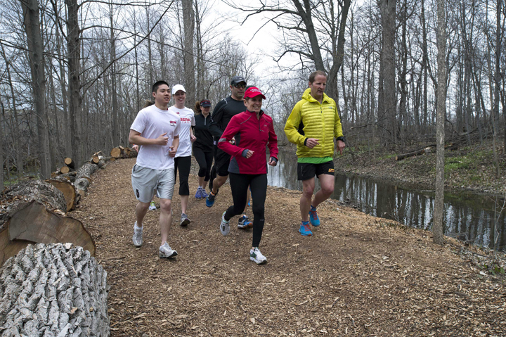Ontario Premier Kathleen Wynne leads a group of runners in Milton, Ontario on Monday May 5, 2014.