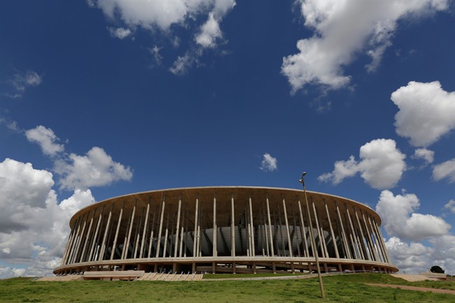 This April 7, 2014, photo, shows a view of the Mane Garrincha stadium, in Brasilia, Brazil. The cost of building Brasilia’s World Cup stadium has nearly tripled, largely due to allegedly fraudulent billing, government auditors say. 