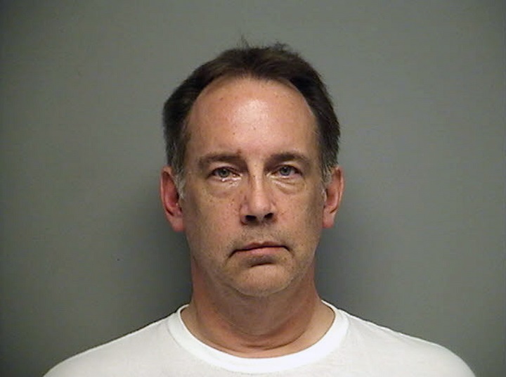 In this undated booking photo released by Walworth County Sheriff's Office, Steven Zelich is seen. The former police officer has been charged Thursday, June 26, 2014, with hiding a corpse after the bodies of two women were found stuffed in suitcases deposited along a rural road in Wisconsin. (AP Photo/Walworth County Sheriff's Office).