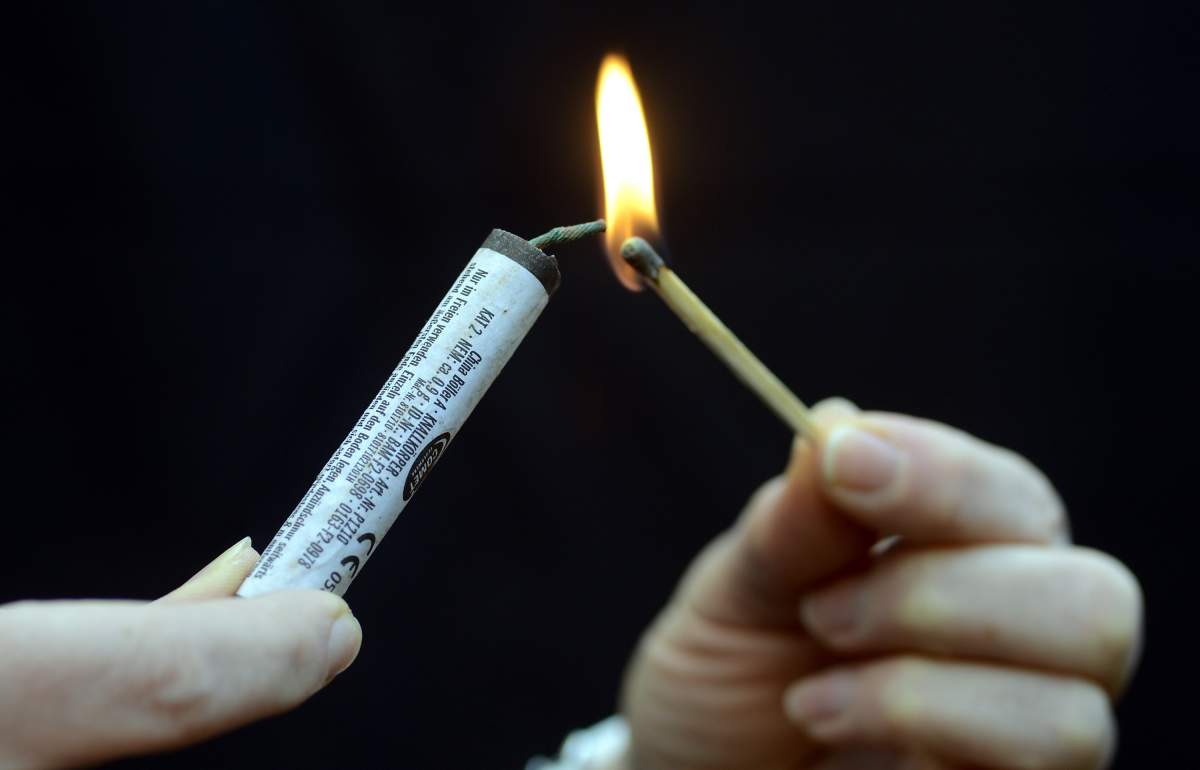 Never hold a lit firework.