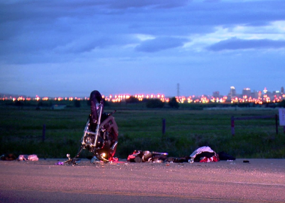 Debris sits near a motorcycle involved in a collision on Highway 22X on Tuesday, June 10th, 2014.   