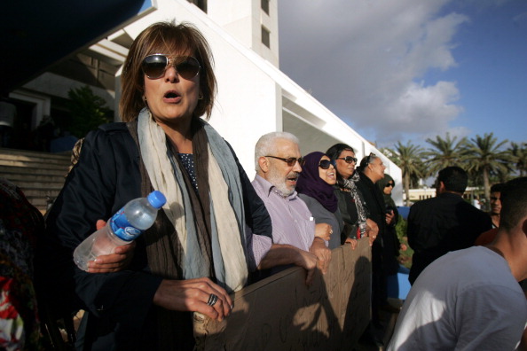 A picture dated on May 13, 2013 shows Libyan Human rights activist Salwa Bugaighis (L), a lawyer who played an active part in Libya's 2011 revolution, which overthrew the regime of Moamer Kadhafi. Bugaighis was shot dead by unknown assailants at her home in the restive east Libyan city of Benghazi late on June 26, 2014, hospital and security sources said. 