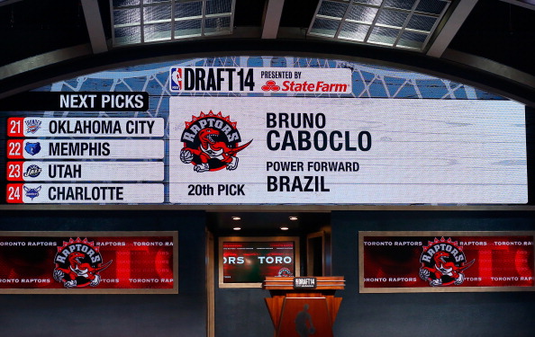 A video screen shows the selection of Bruno Caboclo of Brazil as the #20 overall pick in the first round by the Toronto Rapters during the 2014 NBA Draft at Barclays Center on June 26, 2014 in the Brooklyn borough of New York City. 