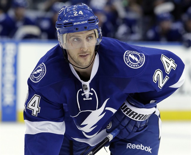 FILE - This March 6, 2014 file photo shows Tampa Bay Lightning forward Ryan Callahan (24) during the second period of an NHL hockey game against the Buffalo Sabres in Tampa, Fla. 