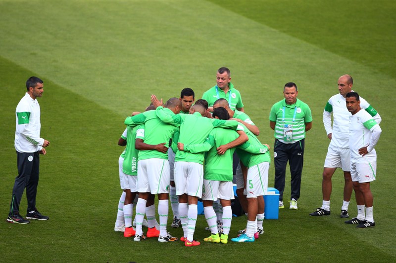 Algeria huddle prior to the 2014 FIFA World Cup Brazil Group H match between South Korea and Algeria at Estadio Beira-Rio on June 22, 2014 in Porto Alegre, Brazil. (Photo by Paul Gilham/Getty Images).