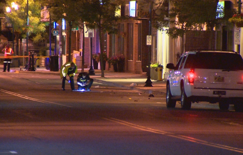 Police investigate scene were two road crew workers were struck by a vehicle.