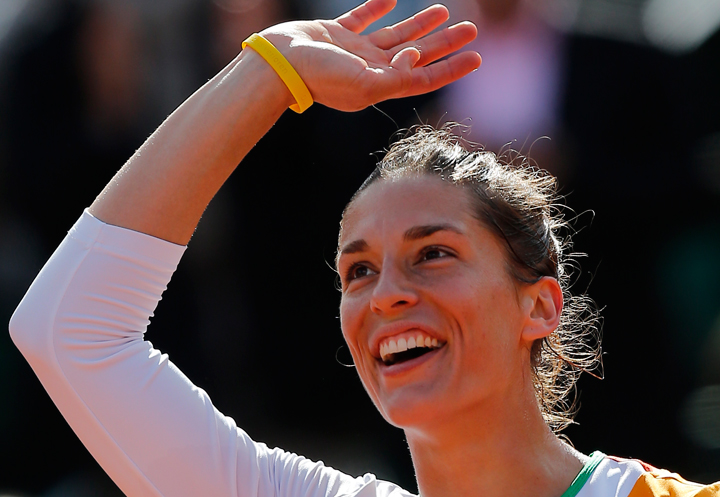 Germany's Andrea Petkovic celebrates winning her quarterfinal match of the French Open tennis tournament against Italy's Sara Errani at the Roland Garros stadium, in Paris, France, Wednesday, June 4, 2014. 