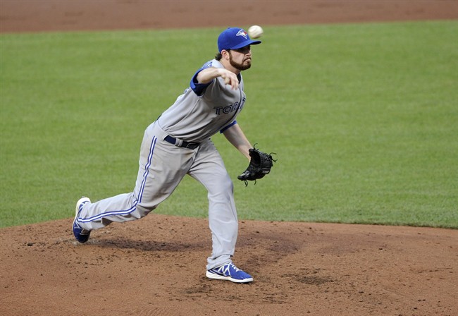 Toronto Blue Jays starting pitcher Drew Hutchison delivers against the Baltimore Orioles during the third inning of a baseball game on Friday, June 13, 2014, in Baltimore. (AP Photo/Nick Wass).