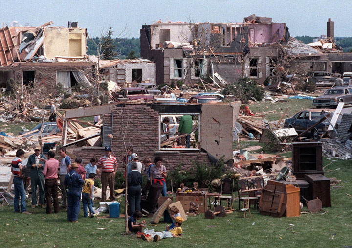 Neighbours and volunteers take time out for lunch on June 2, 1985 as clean-up efforts begin in Barrie following a major tornado.