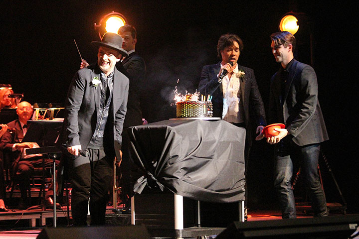 Boy George is surprised with a birthday cake on stage in Toronto on June 14, 2014.