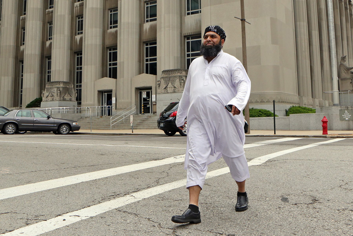 Muslim taxicab driver Raja Naeem leaves the Carnahan Courthouse in downtown St. Louis on Monday, June 9, 2014, after final arguments were heard before Judge Robert Dierker jr. concerning Naeem's attire while driving a cab.