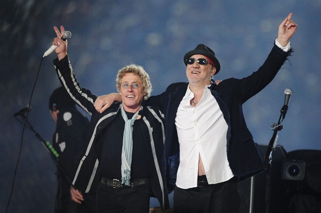 Roger Daltrey, left, and Pete Townshend acknowledge the crowd after performing at the Super Bowl in 2010. Townshend and Daltrey are taking the band on the road to celebrate The Who's 50th anniversary.