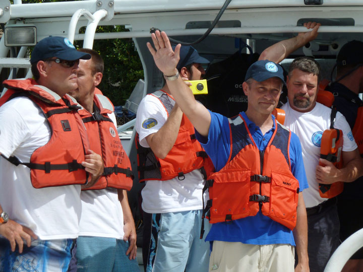 Fabien Cousteau waves on Sunday, June 1, 2014, from the boat taking him from Florida International University's Medina Aquarius Program headquarters in Islamorada, Fla., to the waters above Aquarius Reef Base in the Florida Keys National Marine Sanctuary. 