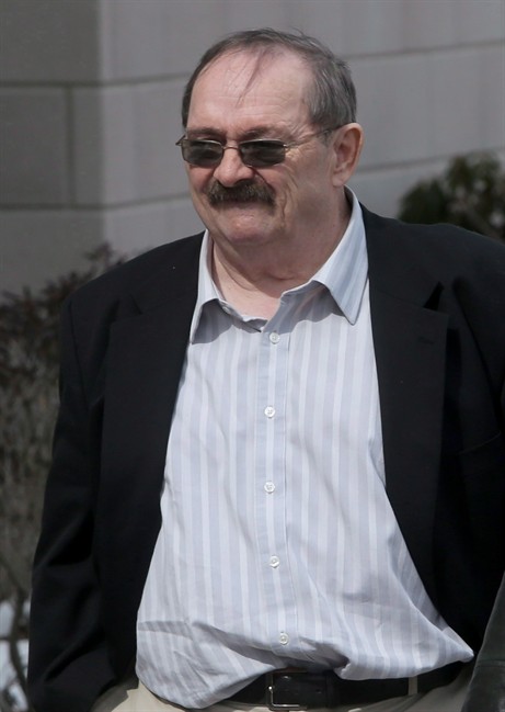 John Leonard MacKean arrives at court in Bridgewater, N.S. on March 17, 2014.