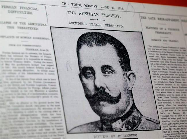 This April 4, 2014 photo shows a reproduction of a London newspaper front page from 1914, which writes about the assassination of Archduke Franz Ferdinand, at the National World War I Museum in Kansas City, Mo. On the last Sunday of June in 1914, a 19-year-old student fired two pistol shots that killed the Austrian Archduke Franz Ferdinand and his wife, Sophie. The echoes of those shots have never really died away. THE CANADIAN PRESS/AP, Charlie Riedel.