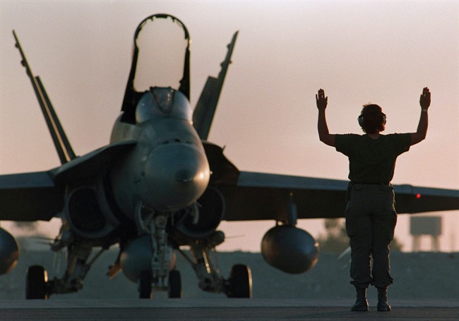 A Canadian CF-18 gets the go-ahead for takeoff.